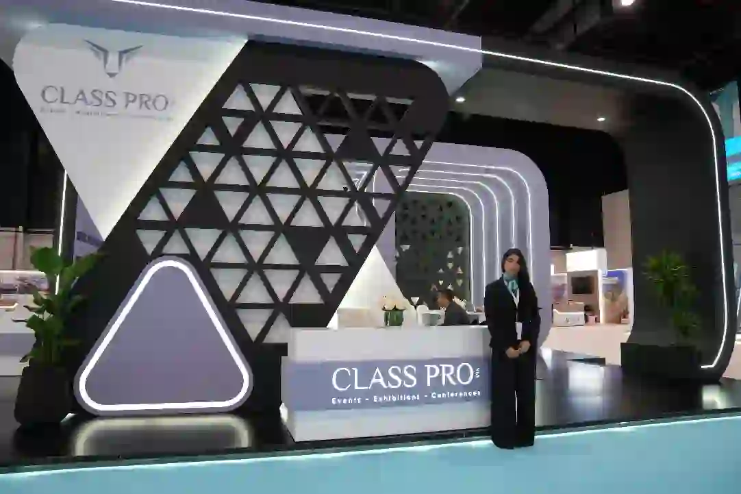 An aerial view of a river surrounded by lush green trees.